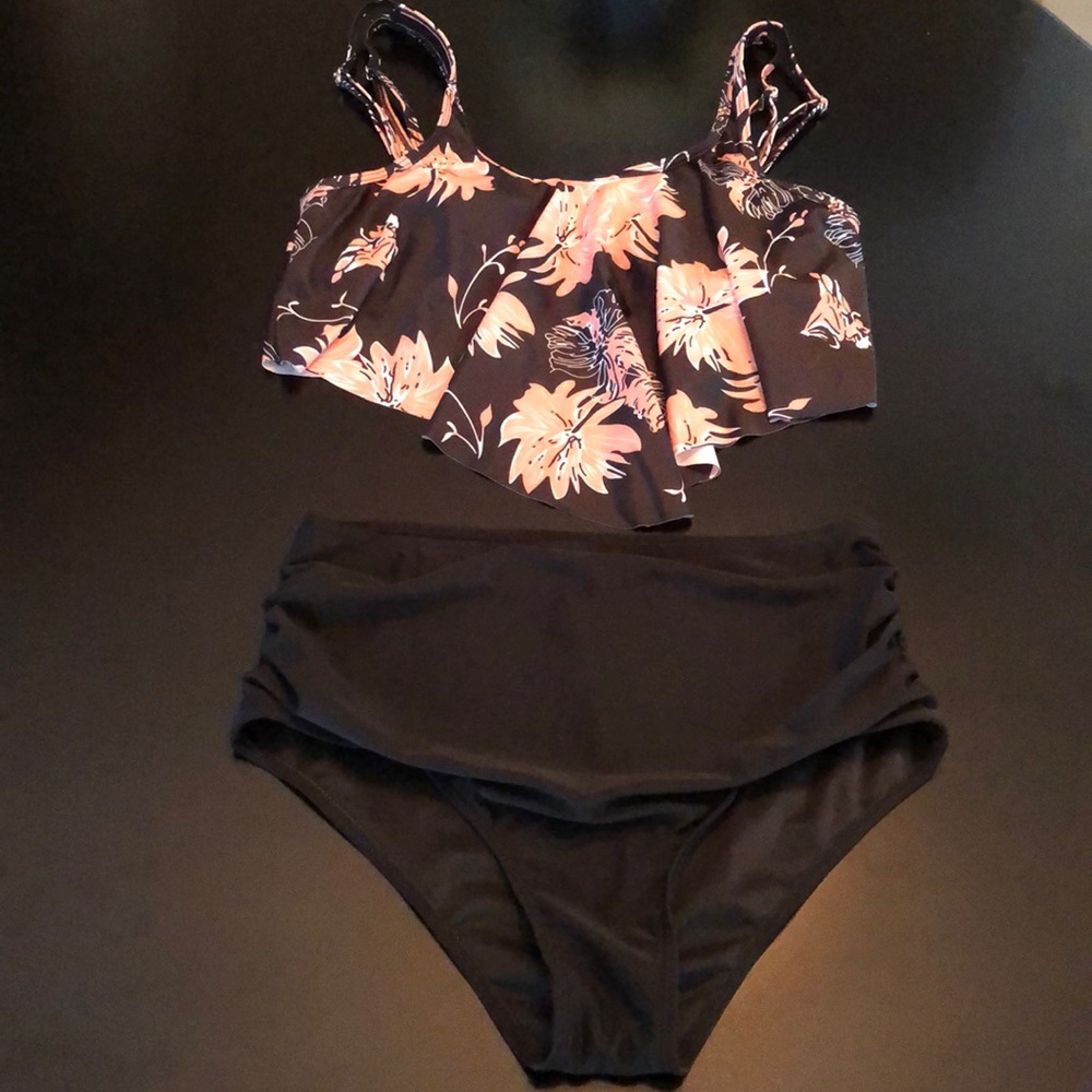 Two piece floral bathing suit.